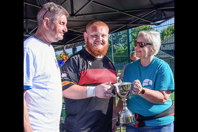 Paula Poole presenting a trophy during the event