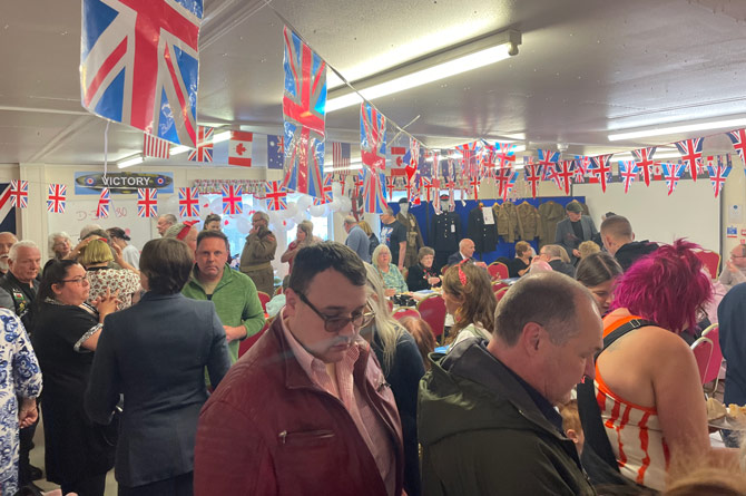 Dozens packed into the community centre to chat over coffee and cake 