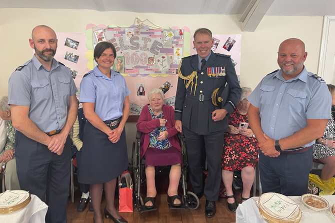 Birthday girl Elsie Jones, middle, next to Air Commodore Rob Woods and other members of the RAF
