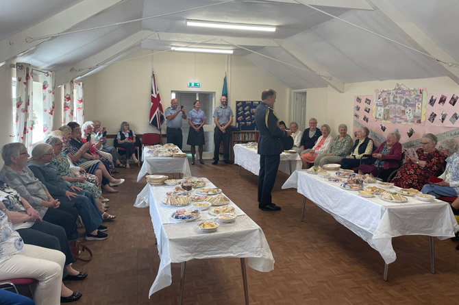 Air Commodore Rob Woods speaking to Elsie 