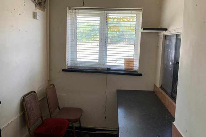 Inside the former taxi office building on Heol Aneurin