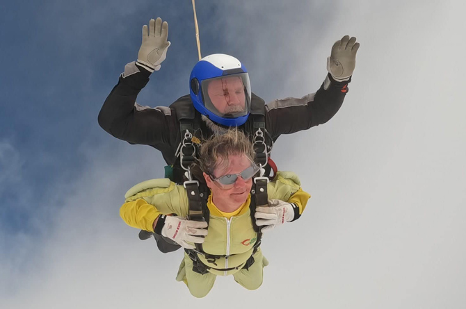 Sue Sims leapt out of plane over Swansea Airfield 