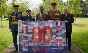 First Minister Vaughan Gething with representatives of the armed forces in Cardiff ahead of the 80th anniversary of D-Day