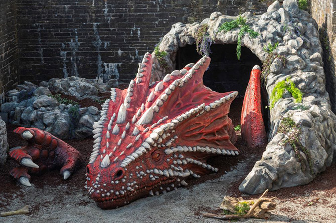 The dragons have returned to Caerphilly Castle after they were moved as part of ongoing improvement works
