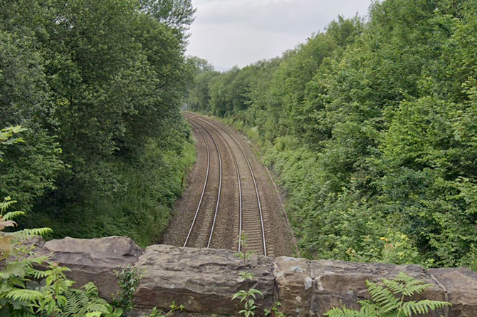 The level crossing, off Van Road, Caerphilly, pictured in the distance