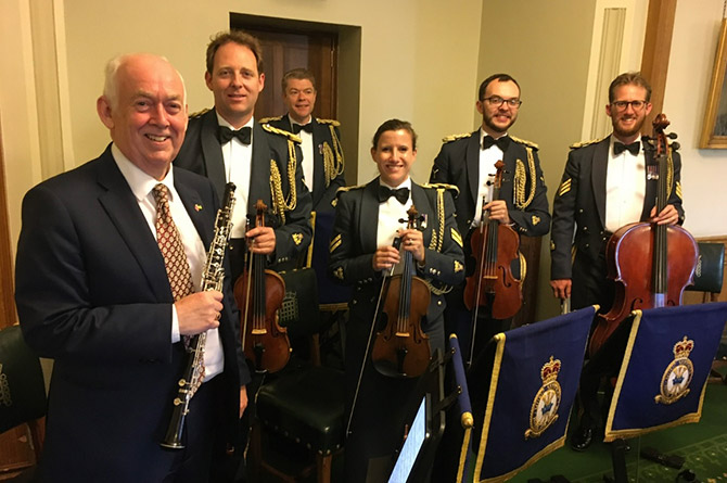 Wayne David with his oboe and members of the RAF Salon Orchestra