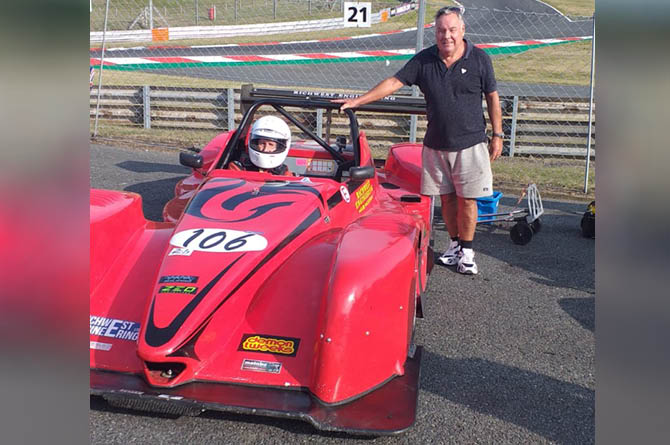 Graham Cole, pictured in the car, alongside battery boy Graeme Clarke