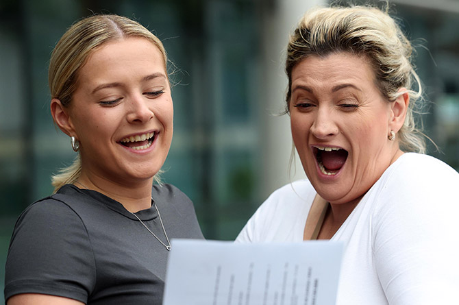 Bethany Evans, left, overjoyed after receiving her A-level results