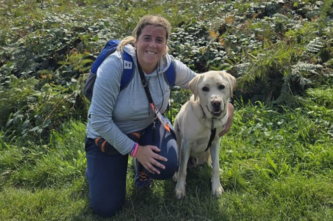 Becky Mason is walking 100km this month with trainee guide dog Thomas