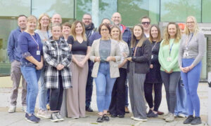 The Caerphilly Cares team collected two honours at the Mental Health and Wellbeing Wales Awards