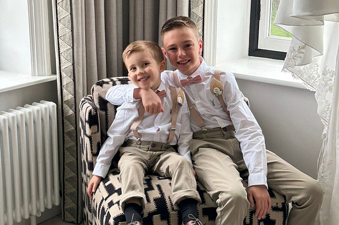 Harry and his older brother Oscar on their parents' wedding day