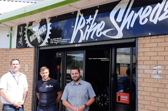Cllr Jamie Pritchard, left, visiting BikeShredz's new base