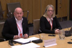 Richard Collier-Keywood and Abi Tierney giving evidence to the Senedd