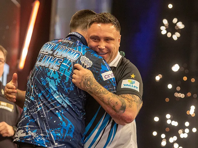 Gerwyn Price congratulates Luke Humphries during their Night Four encounter