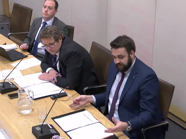 From left: Senedd Members Rhys ab Owen, Joel James, and Luke Fletcher during the committee meeting