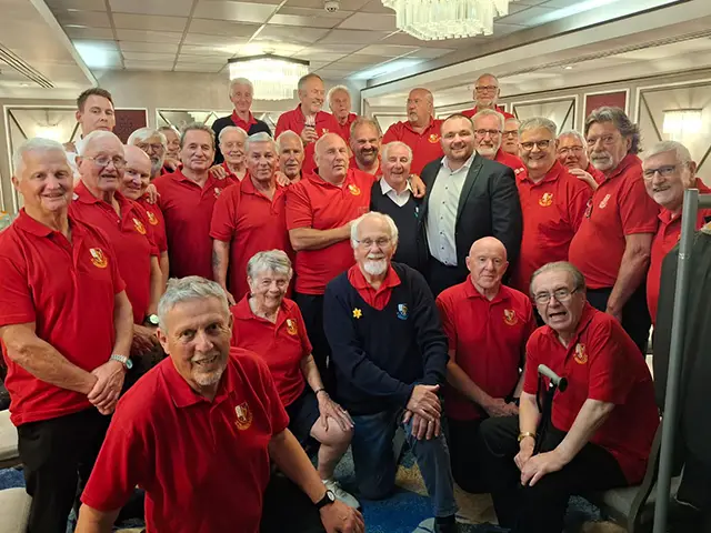 Aber Valley Male Voice Choir with Wales and Lions rugby stars Ken Owens and Liam Williams