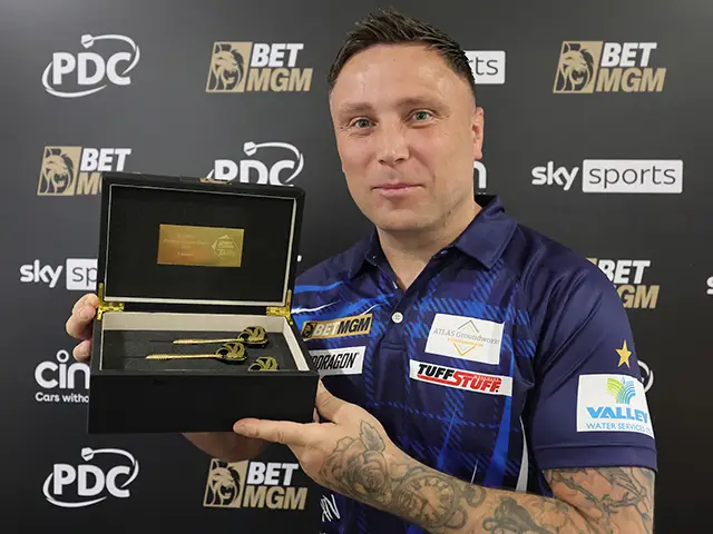 Gerwyn Price was presented with a custom-made set of solid gold darts - his second of the campaign