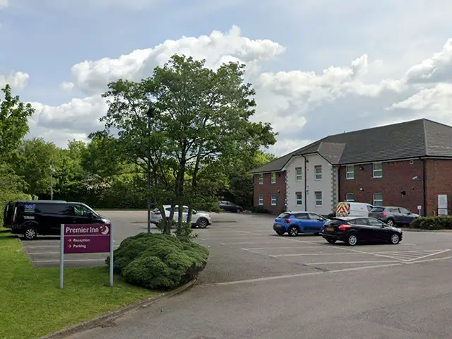 View of the Premier Inn Crossways hotel, Caerphilly, pictured in May 2023. The proposed extension would be built at the rear of the car park area shown