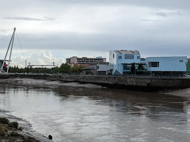 The River Usk in Newport, with the Riverfront Theatre on the right