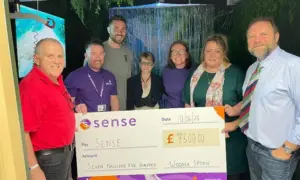 From left: Huw Thomas, chair of Wooden Spoon Wales; Owain Rees, regional fundraising manager for Sense in Wales; George Nott; Lucy Romain, operations manager for Sense in Wales; Kate Wright; Claire James and Anthony Evans, both from the Wooden Spoon Wales team