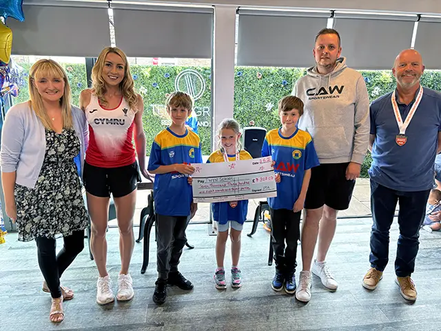 From left: Kate Davey, Olivia Tsim, Twyn school pupils, Craig Williams, and Lee Thomas