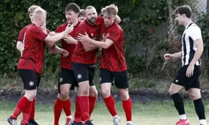 Abercarn players celebrating during their win at Risca United
