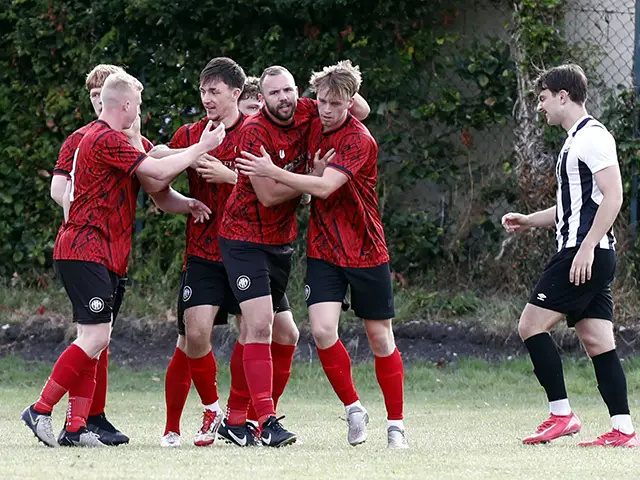 Abercarn players celebrating during their win at Risca United