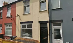35 Liscombe Street (middle house with black door), Newport, picture in June 2025