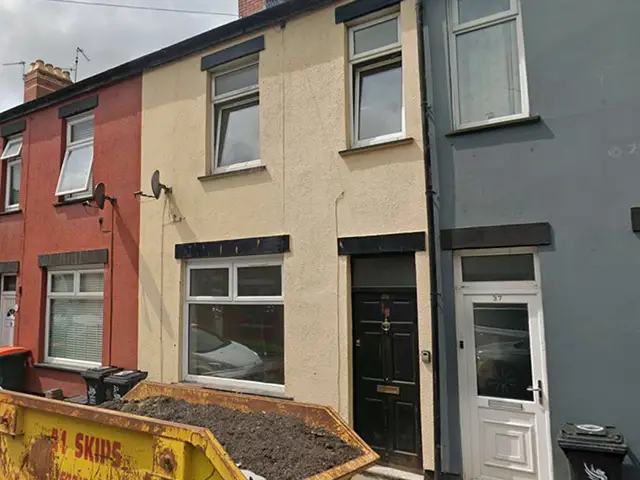 35 Liscombe Street (middle house with black door), Newport, picture in June 2025