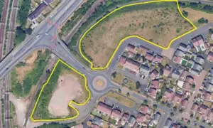 Aerial image (with development site marked in yellow) of Mon Bank, Newport