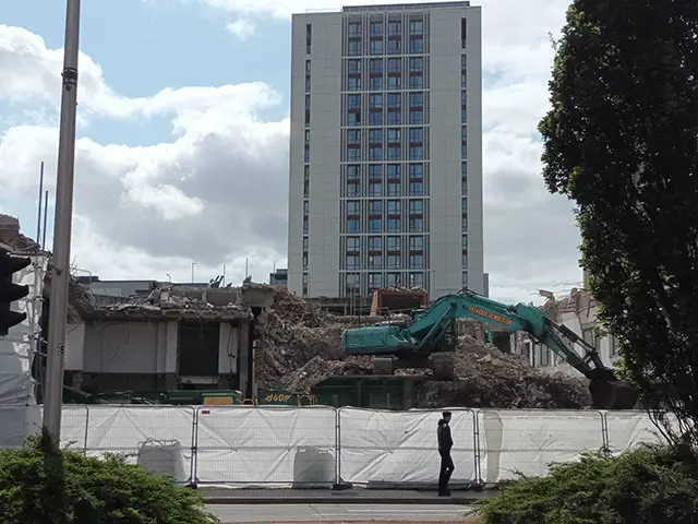 Pictures showing the demolition of Harlech Court in Cardiff city centre