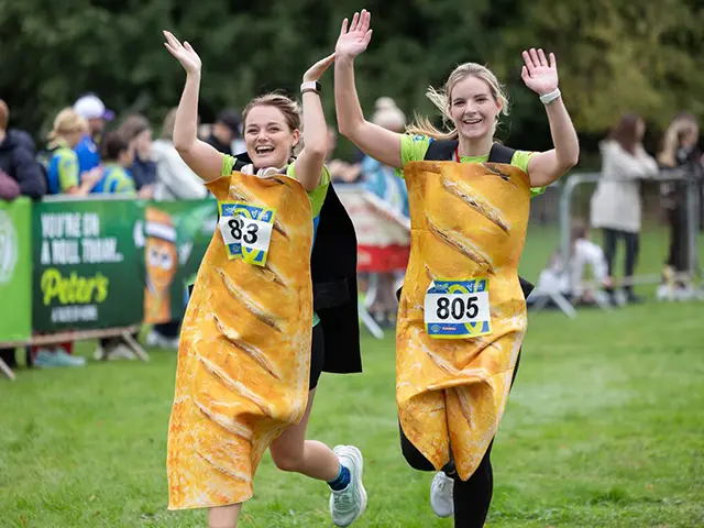 Runners dressed up as sausage rolls