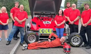 Graham Cole, centre, with members of his Richwest Engineering/GCCRacing team