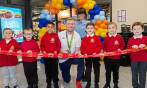 Llanfabon Infants' pupils were joined by Sam Cross to open the new Aldi in Nelson