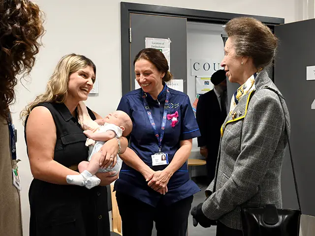 Princess Anne with Elisia Rogers, trustee of BABI Group, left; and consultant midwife Emma Mills, centre