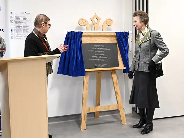 Princess Anne, right, unveiling the commemorative plaque with Ann Lloyd