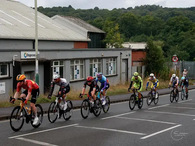 Cyclists passing the former Stagecoach depot in Pontllanfraith
