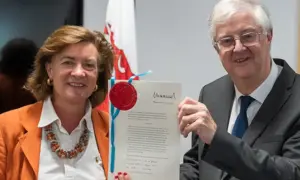 First Minister Eluned Morgan and finance minister Mark Drakeford with the Royal-approved legislation