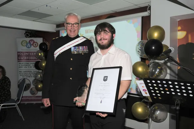 High Sheriff of Gwent, Colonel Ralph Griffin, presenting Toby Jones, of The Parish Trust, with the High Sheriff's Award