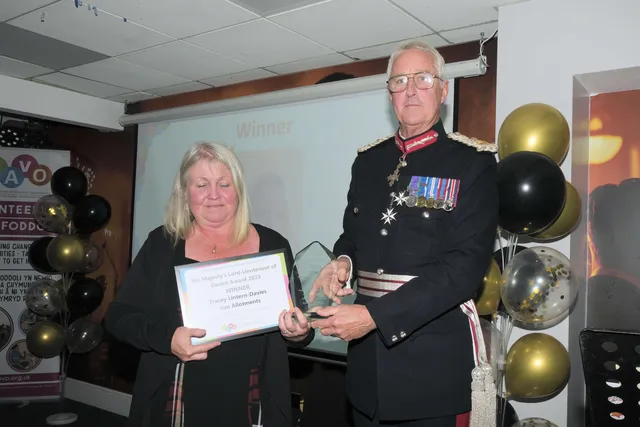 Tracy Lintern-Davies, of Van Allotments, receives His Majesty’s Lord Lieutenant of Gwent Award from the Lord Lieutenant of Gwent, Brigadier Robert Aitken CBE