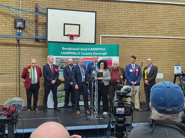The candidates on stage as the results are announced