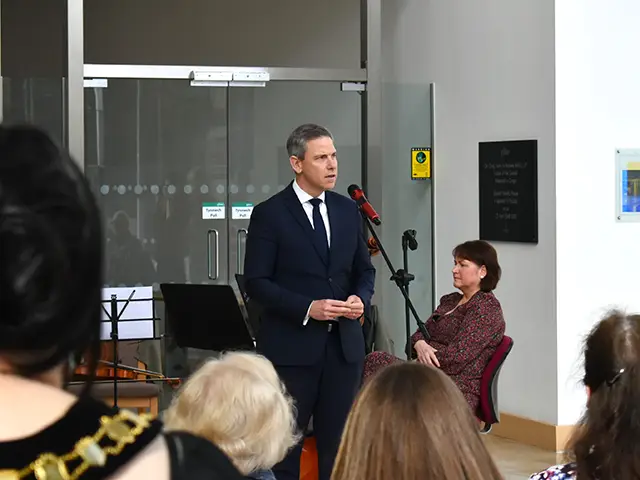 Caerphilly MP Chris Evans speaking at the closing event for Olesia Miftahova's solo art exhibition at Ty Penallta