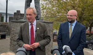 Reform leader Nigel Farage and his candidate, Llŷr Powell