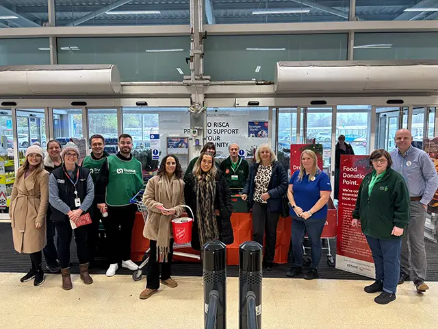 Staff from Tesco and Risca Food Bank, alongside Newport West and Islwyn MS Ruth Jones