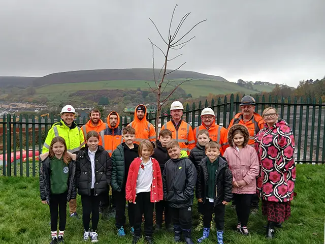 Ysgol Ifor Bach pupils have planted trees at the site of the new housing development on the former Windsor Colliery