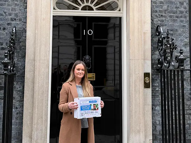 Ellie James handing in the petition to 10 Downing Street
