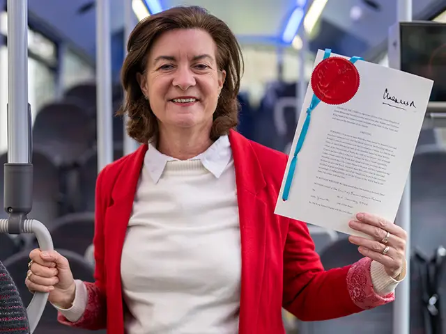 First Minister Eluned Morgan with the Bus Services (Wales) Bill, which has now received Royal Assent