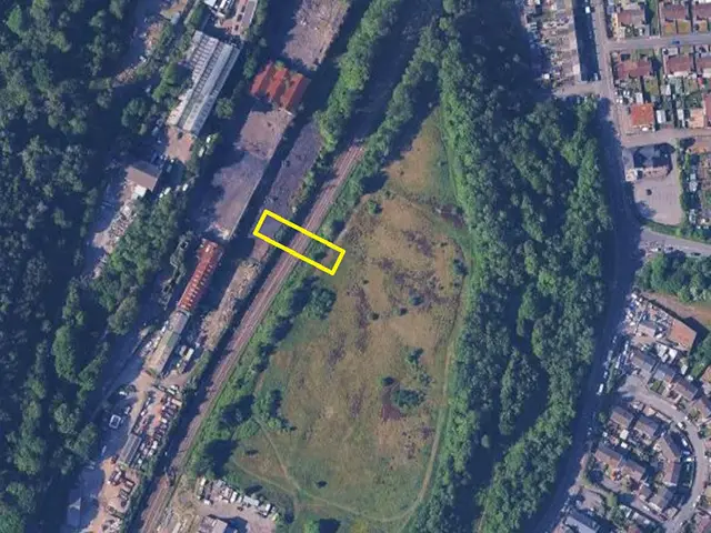 Aerial view of the railway line near Llanbradach, with the relevant area of footpath marked roughly in yellow