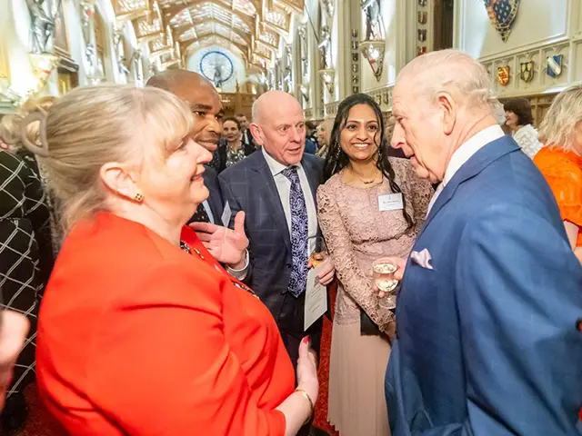 Carol Dight, left, meeting King Charles at Windsor Castle