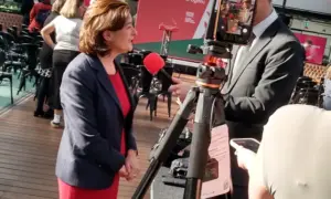 First Minister Eluned Morgan speaking to a reporter at Welsh Labour's manifesto launch